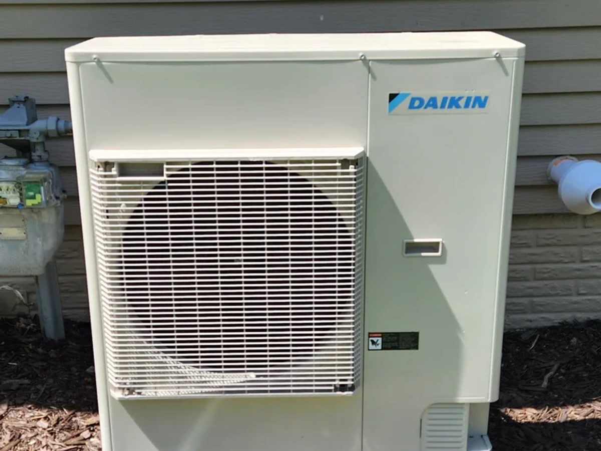 Finished condenser installation on a Springfield-area property.