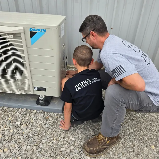 Derek and Brody servicing a Daikin outdoor unit